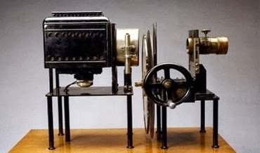 first projector invented